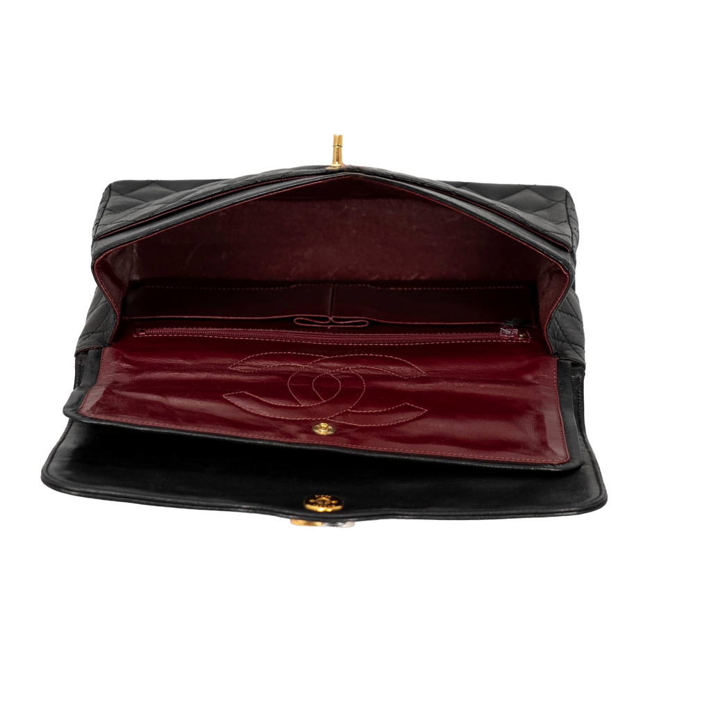 Your Bag Now Mine Chanel Matelasse shoulder bag in black quilted leather with open flap and burgundy interior