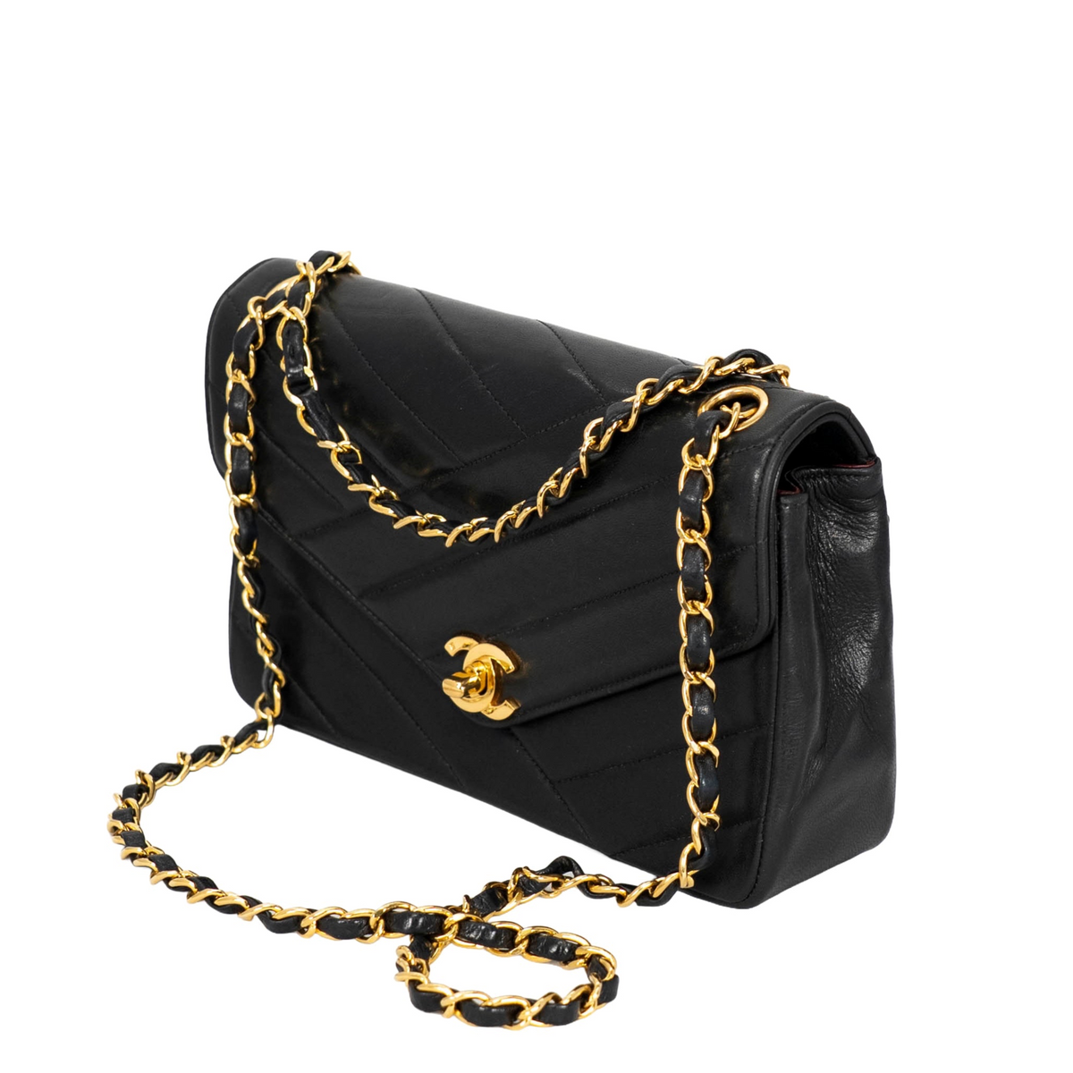 Your Bag Now Mine Chanel black chevron-quilted lambskin flap bag with gold-tone chain strap and CC turn-lock closure
