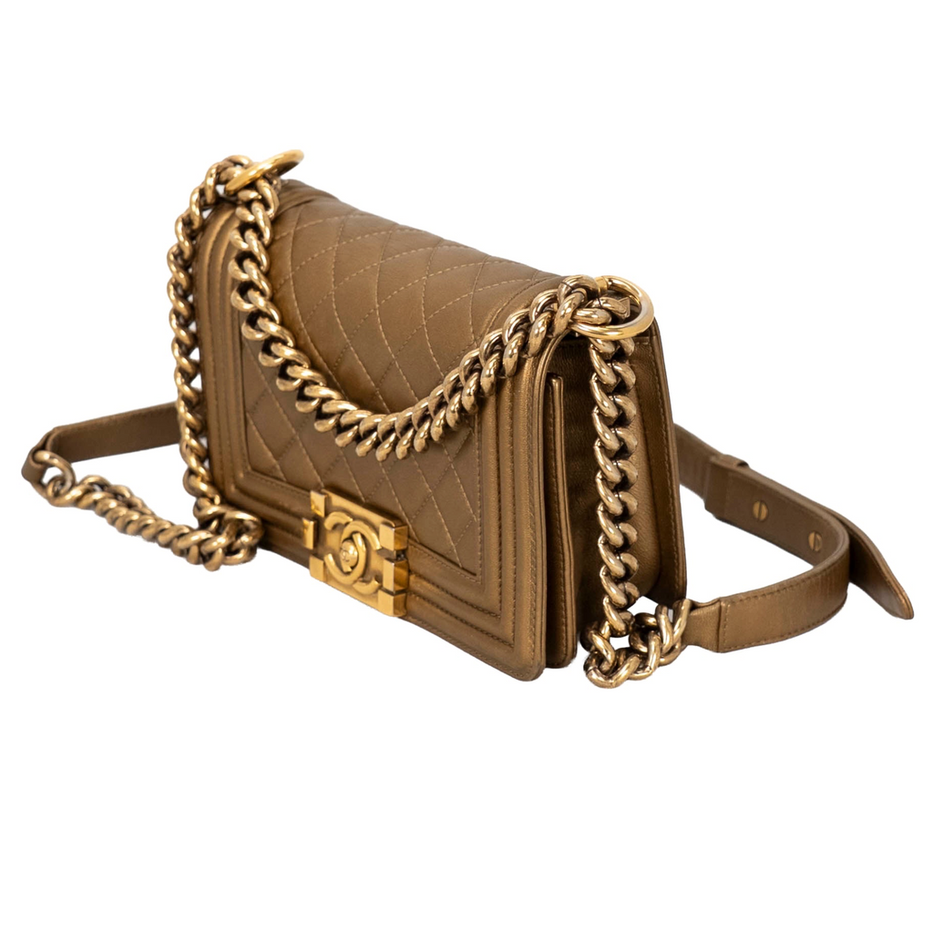 Chanel Boy Flap Bag in metallic bronze/gold quilted leather featuring aged or antique gold-tone hardware