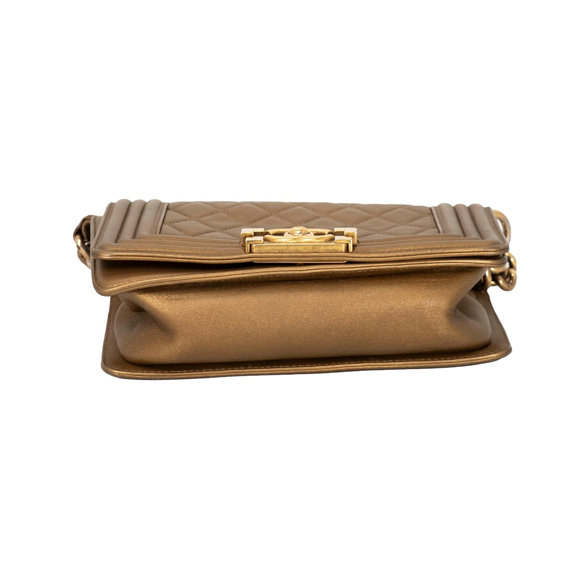 Bottom view of Chanel Boy Flap Bag in metallic bronze/gold quilted leather featuring aged or antique gold-tone hardware