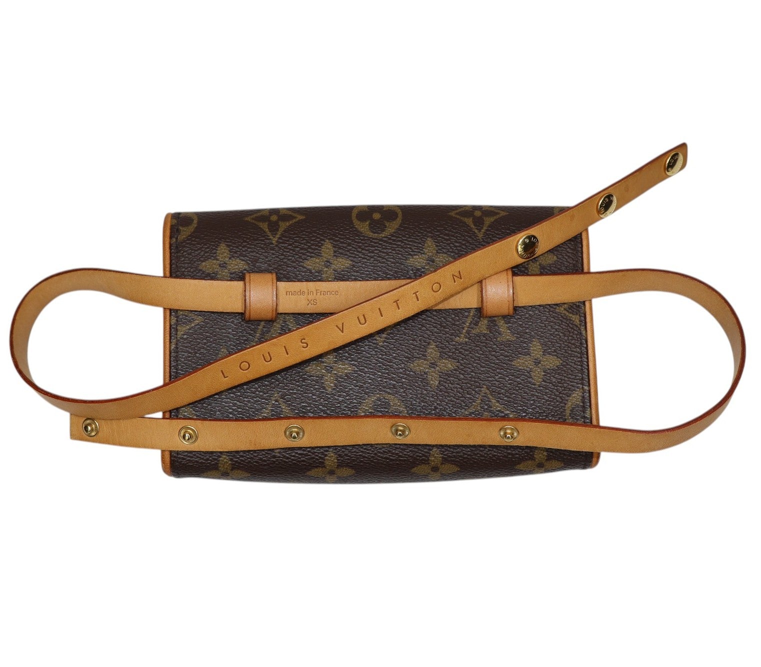 back view Louis Vuitton monogram canvas pochette belt bag style bag with a tan leather strap, shown against a plain white background.