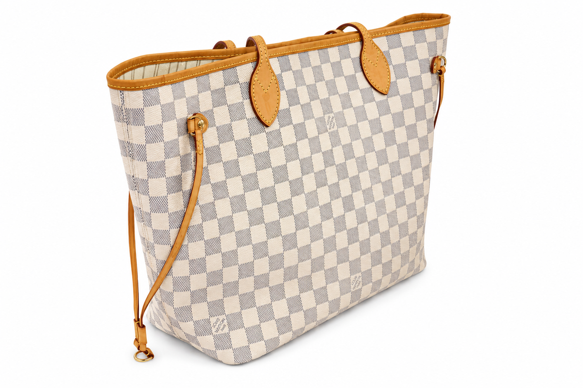 A Louis Vuitton Neverfull tote bag in Damier Azur canvas with tan leather trim and shoulder straps, shown on an angle on a plain white background.