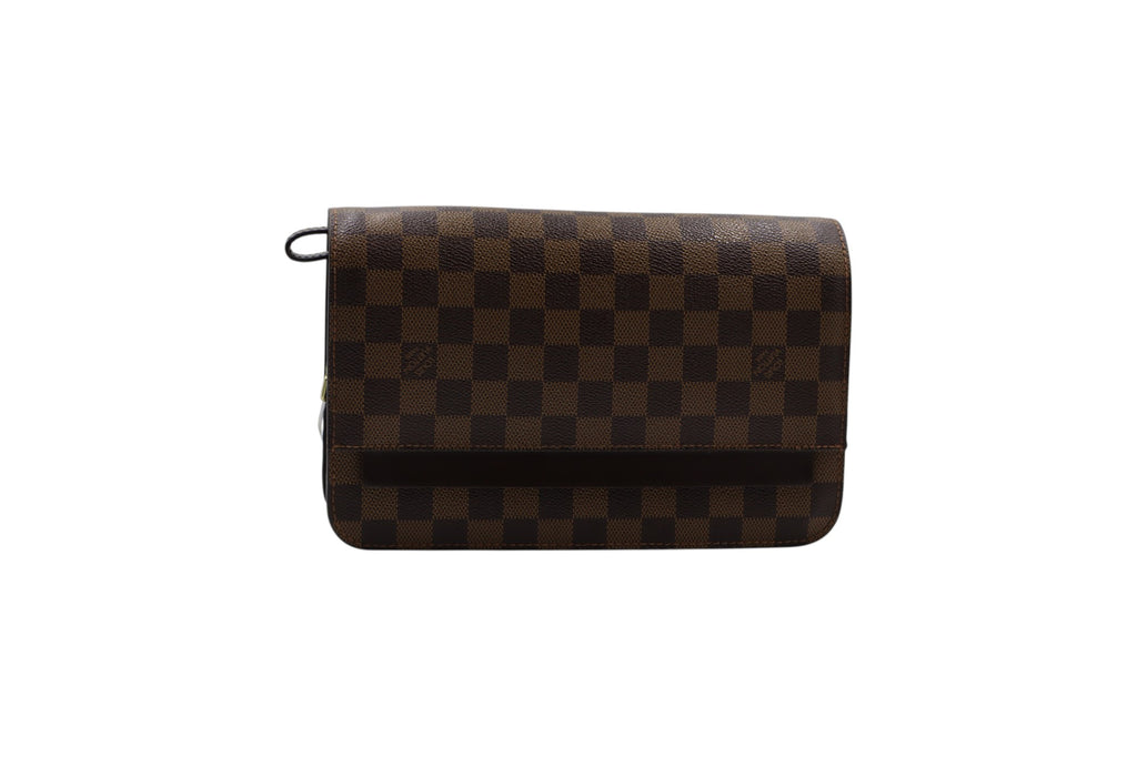 A Louis Vuitton clutch in the Damier Ebene checkered canvas, featuring a brown and dark brown checkerboard pattern with a black top loop, shown against a plain white background.
