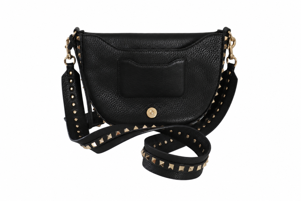 A Valentino black pebbled leather crescent-shaped shoulder bag with gold-tone hardware and a studded strap shown open, shown on a plain white background.