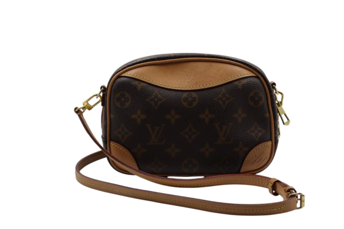 back view Louis Vuitton monogram crossbody bag in dark brown coated canvas with tan leather trim and a matching adjustable shoulder strap.