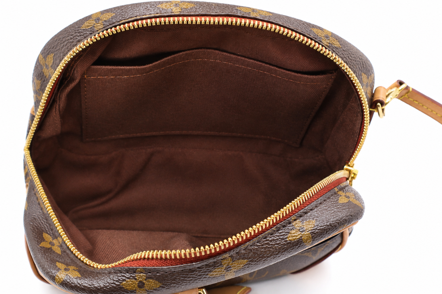interior view of Louis Vuitton monogram canvas crossbody bag showing the brown interior lining and gold-tone zipper.