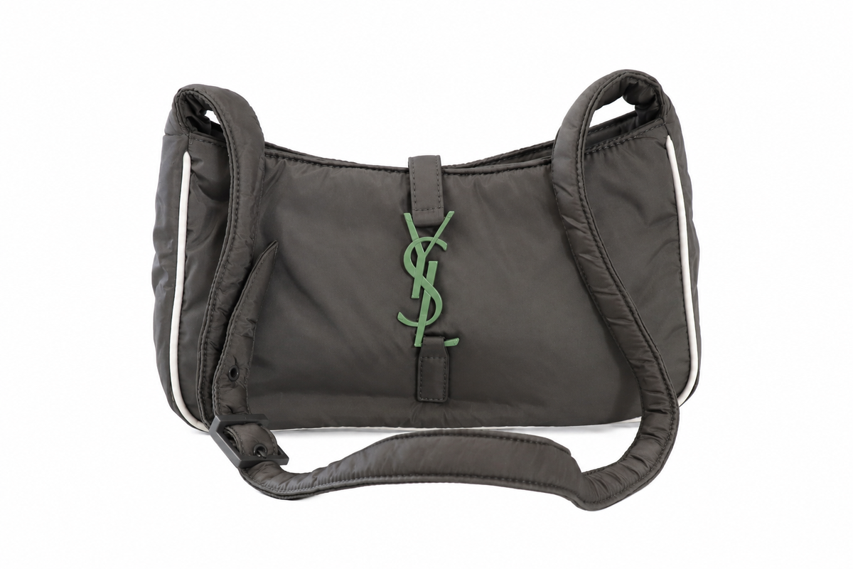 Yves Saint Laurent dark gray nylon shoulder bag with a green YSL monogram logo on the front, featuring a padded shoulder strap and white piping details on the sides.