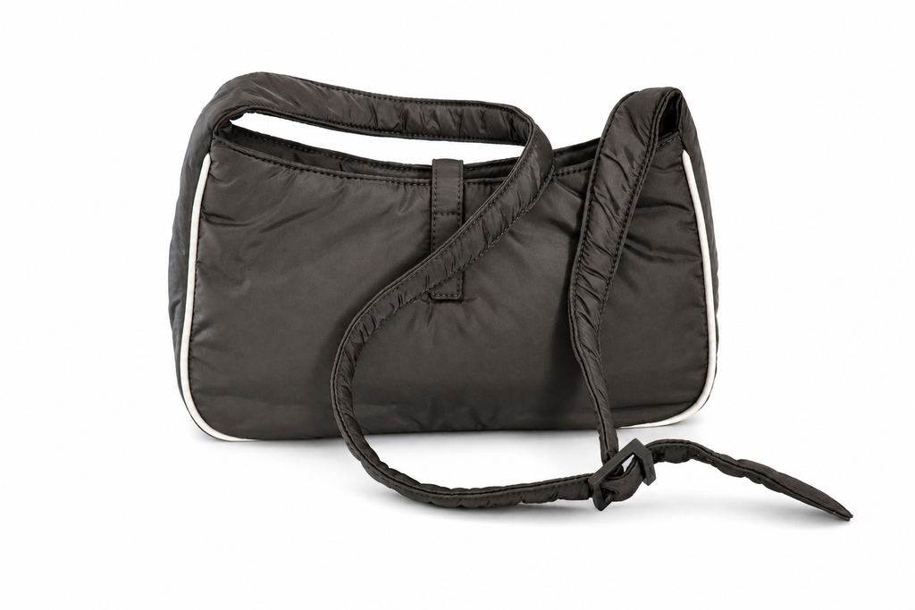 Yves Saint Laurent dark grey nylon shoulder bag with white piping trim and a matching black shoulder strap, shown on a plain white background.