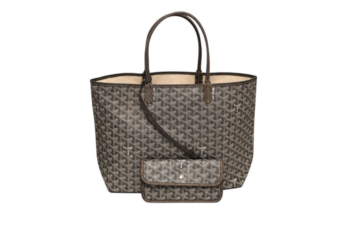 Front view of Goyard Saint Louis tote bag in gray and black Goyardine canvas with dark leather shoulder handles and matching detachable pouch on a white background.