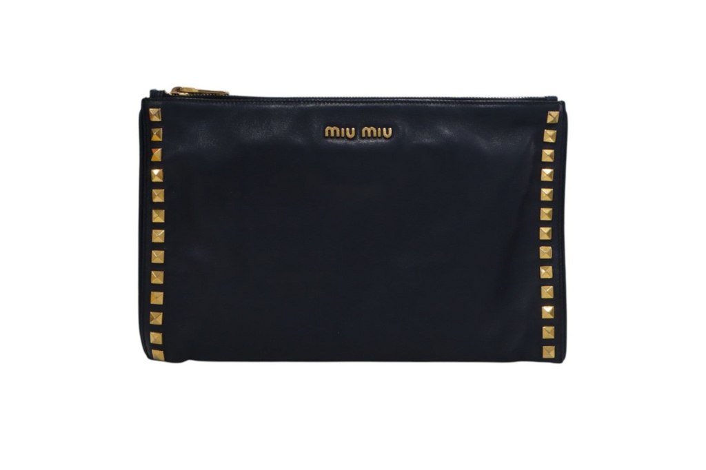 front view black leather Miu Miu zip-around pouch with gold-tone studs along the edges and a gold logo on the front.