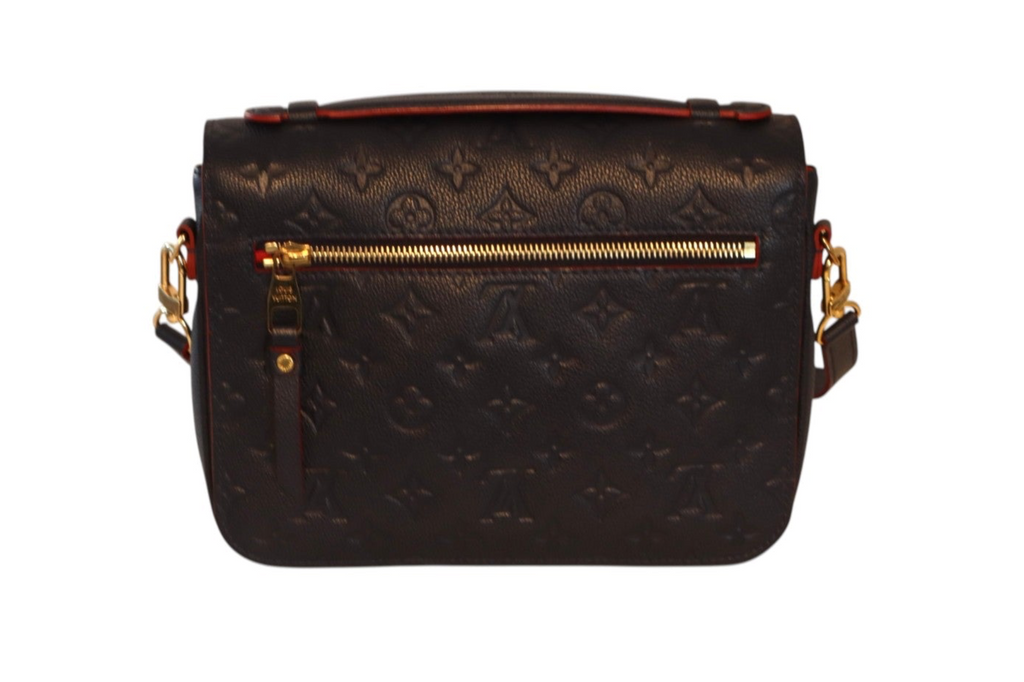 A navy leather Louis Vuitton monogram shoulder bag with gold-tone hardware.